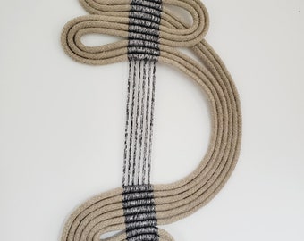 minimalist macramé in natural rope for modern interior