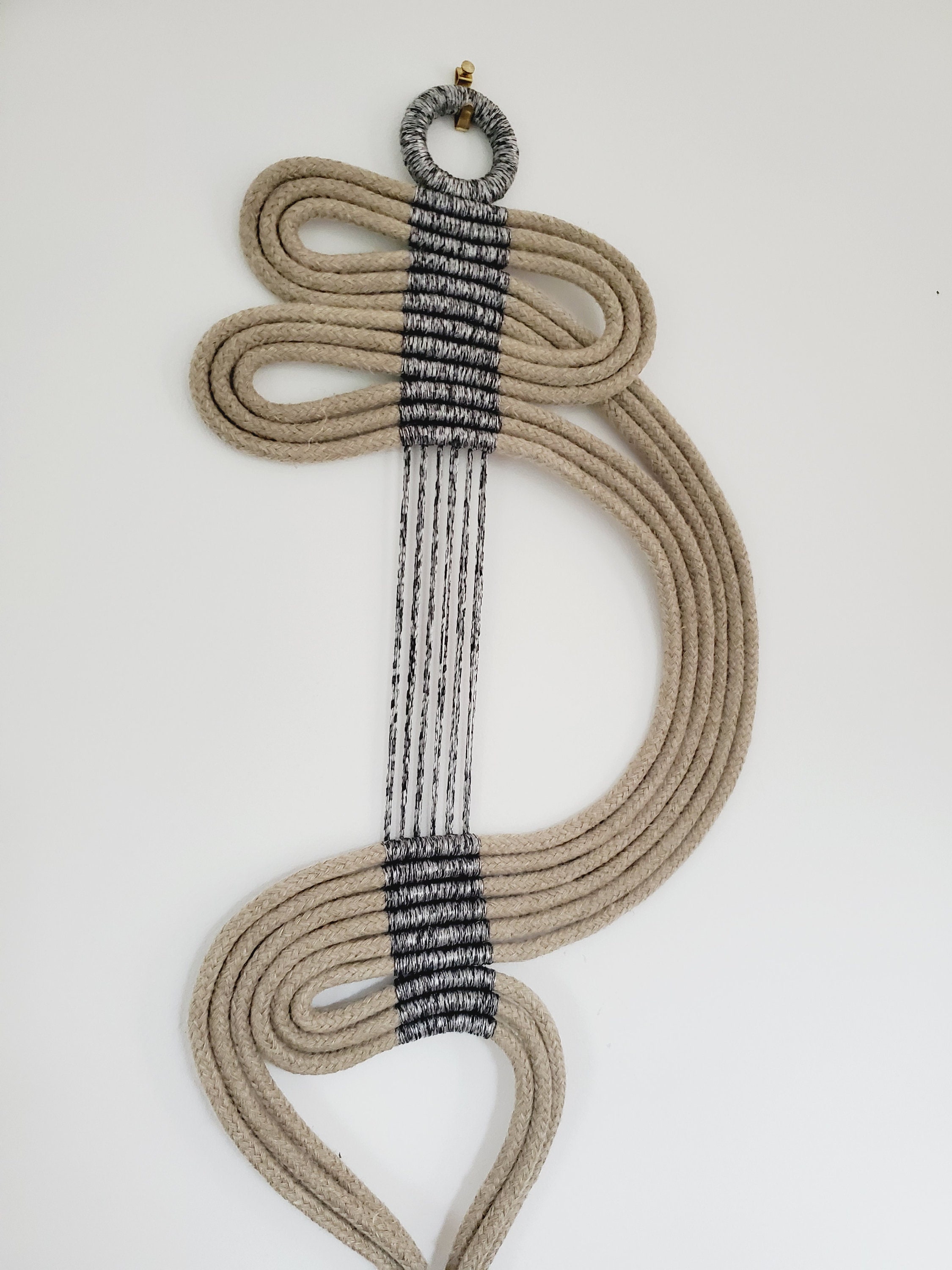 minimalist macrame in natural rope for modern interior