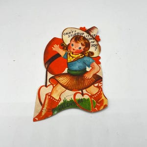 Vintage 1930s Valentinstag Karte eines kleinen Mädchens, das als Cowgirl verkleidet ist