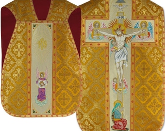 May include: A gold and red liturgical vestment with a white embroidered image of Jesus Christ on the cross. The image includes angels, a dove, and the text "IN-RI".