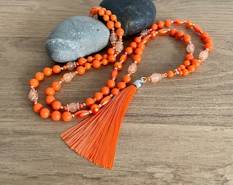 Collana con nappe di perline arancioni: lunga in stile boho