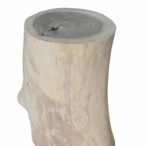 May include: A natural wood stool with a round top and a unique, irregular shape. The stool is made from a single piece of wood and has a light brown color.