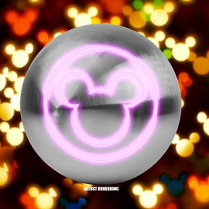 Könnte beinhalten: Eine silberne Kugel mit einer leuchtend pinkfarbenen Mickey Mouse-Umrisslinie. Der Hintergrund zeigt verschwommene Lichter in verschiedenen Farben. Der Text "ARTIST RENDERING" befindet sich unten.