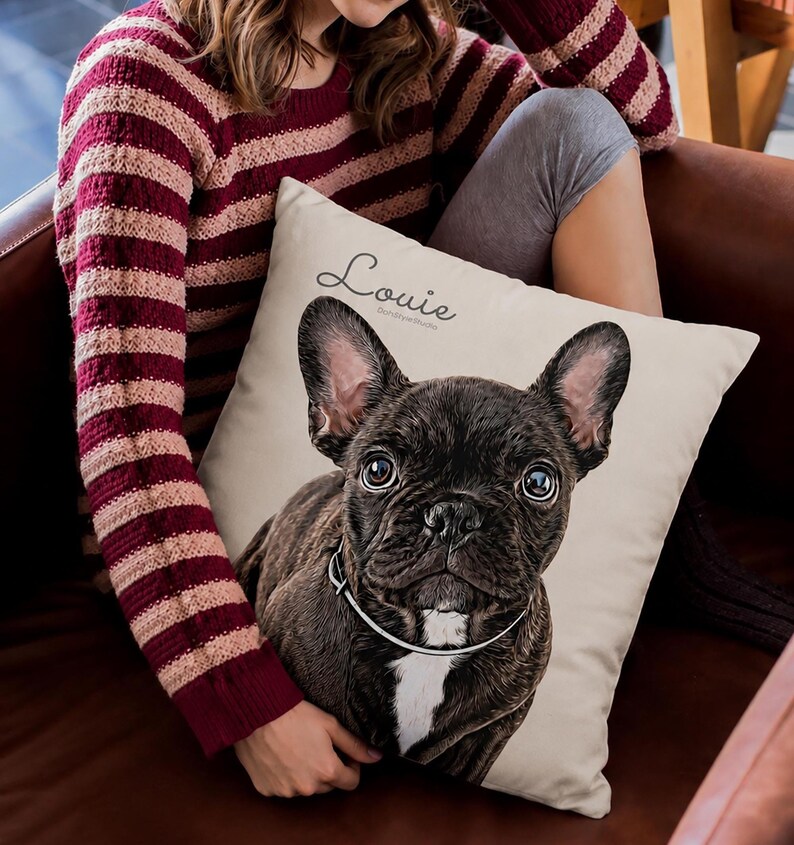 May include: A square throw pillow with a cream-colored background featuring a detailed illustration of a dark brindle French Bulldog with a white chest patch and a thin collar. The name Louie is printed in a cursive script above the dog's head.