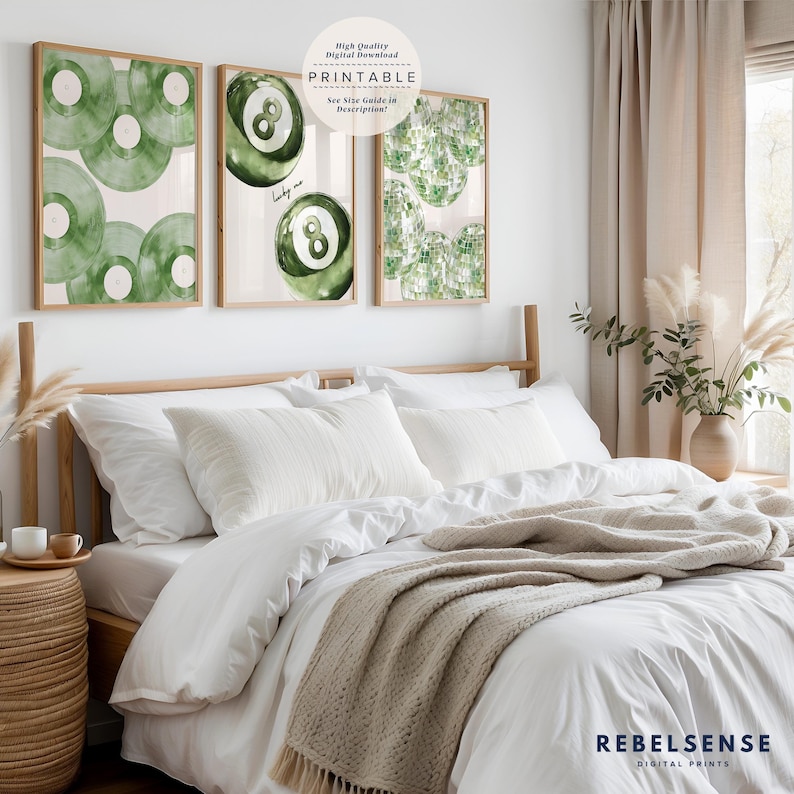 May include: Three framed wall art prints with a green theme. One print features green vinyl records, another a green eight-ball, and the third a green disco ball design. The prints are displayed above a bed with white bedding. The text "PRINTABLE" is visible.