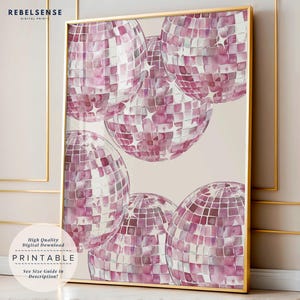May include: A framed print with a watercolour illustration of pink disco balls. The balls have a mosaic pattern and are set against a neutral background. The print is labelled "PRINTABLE" with the text "High Quality Digital Download".