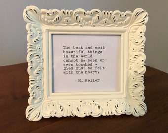 The best and most beautiful things, quote by Helen Keller. Frame is metal and measures 4.5 x 3.5"