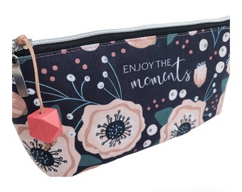 Large cosmetic bag made of canvas with statement “Enjoy the moments”