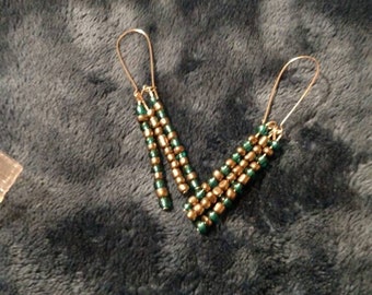Three dangling beads. Earrings
