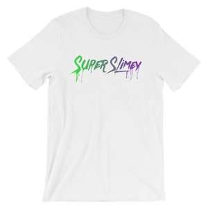 May include: White t-shirt with a green and purple graphic that says "Super Slimey" with dripping paint.