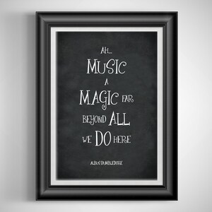 May include: Black and white printable quote on a chalkboard background. The quote reads "Ah... Music a magic far beyond all we do here" and is attributed to Albus Dumbledore.
