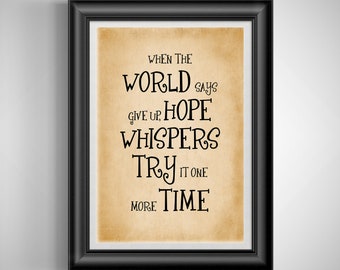 May include: Black framed print with a tan background and black text. The text reads: "When the world says give up, hope whispers try it one more time."