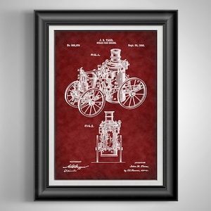 May include: Framed print of a vintage steam fire engine diagram in white on a burgundy background. The diagram includes two detailed illustrations, labeled FIG. 1 and FIG. 2, with technical annotations and the name "J.B. Tarr" at the top. The print is encased in a black frame.