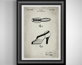 May include: Black framed vintage patent print of a shoe design. The print shows two shoe designs, one from above and one from the side. The print includes the date Nov. 8, 1938, and the name D. Levin.