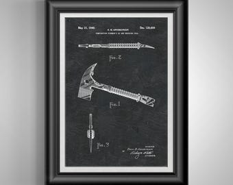 May include: Framed print of a vintage patent illustration for a combination fireman's axe and hooking tool. The black and white diagram shows the tool's design, including a hook, axe head, and handle. The print is in a black frame.