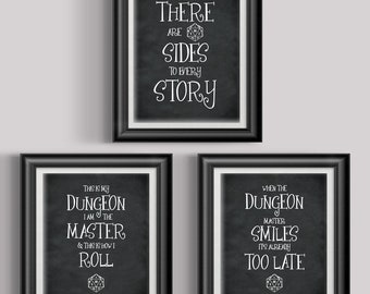 May include: Three framed prints with black frames and white matting. Each print has a black background with white text. The top print reads "THERE ARE SIDES TO EVERY STORY." The bottom left print reads "THIS IS MY DUNGEON I AM THE MASTER & THIS IS HOW I ROLL." The bottom right print reads "WHEN THE DUNGEON MASTER SMILES IT'S ALREADY TOO LATE."