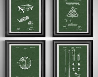 May include: Four framed prints featuring vintage billiard-related patent illustrations in white on a dark green background. The prints depict a pool table, a rack, a billiard ball with the number 15, and various pool cues and accessories.