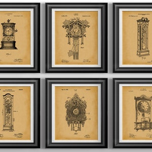 May include: Six framed vintage clock patent prints. Each print features a detailed black and white illustration of a different clock design on a tan background. The frames are black, and the prints are arranged in two rows of three.