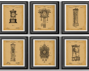 May include: Six framed vintage clock patent prints. Each print features a detailed black and white illustration of a different clock design on a tan background. The frames are black, and the prints are arranged in two rows of three.