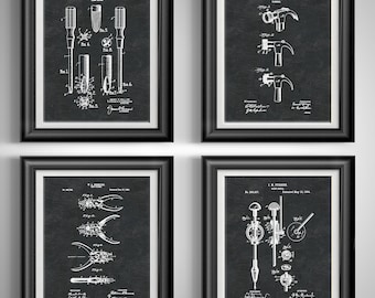 May include: Four framed prints featuring vintage tool patent illustrations in white on a black background. The tools include a screwdriver, hammer, pliers, and a drill. Each print is in a black frame with a white mat.