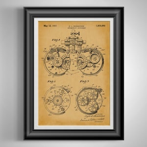 May include: Framed vintage optometry instrument patent print. The print features detailed technical drawings of the instrument, with the text "May 12, 1931" and "C. L. Hunsicker Optometrist Instrument." The print is in a black frame.