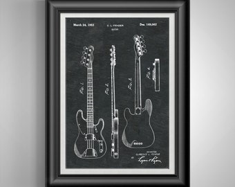 May include: Framed black and white print of a guitar patent. The print includes detailed diagrams of a guitar, with the text "C.L. Fender Guitar" and the date "March 24, 1953." The print is in a black frame.