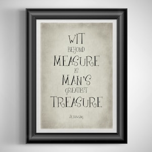 May include: A framed print with the quote "Wit beyond measure is man's greatest treasure" by J.K. Rowling. The text is in black on a beige background, framed in a black frame.