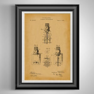 May include: Framed vintage patent print of an automatic fire sprinkler, dated September 4, 1888. The print features detailed technical drawings and the name W. Seracher. The artwork is in a black frame.