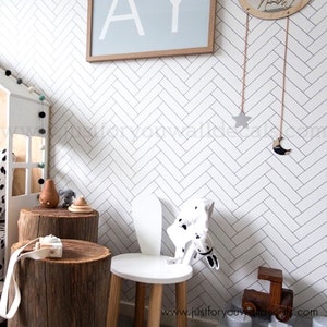 Minimalist herringbone line pattern wallpaper in white and gray
