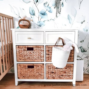 Botanical wallpaper with soft greenery illustrations, perfect for a serene and stylish decor.