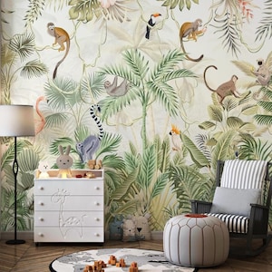 May include: A white chest of drawers with four drawers features a giraffe design. The dresser is in a room with a jungle-themed wallpaper featuring monkeys, toucans, sloths, and palm trees.