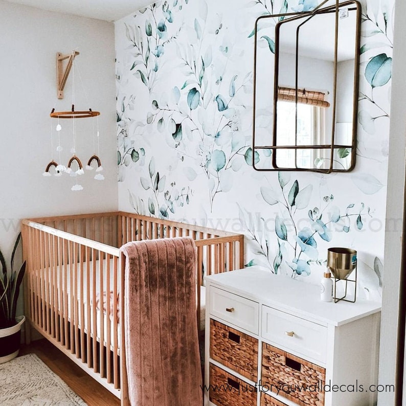 Soothing wallpaper design featuring watercolor eucalyptus branches in gentle shades of green