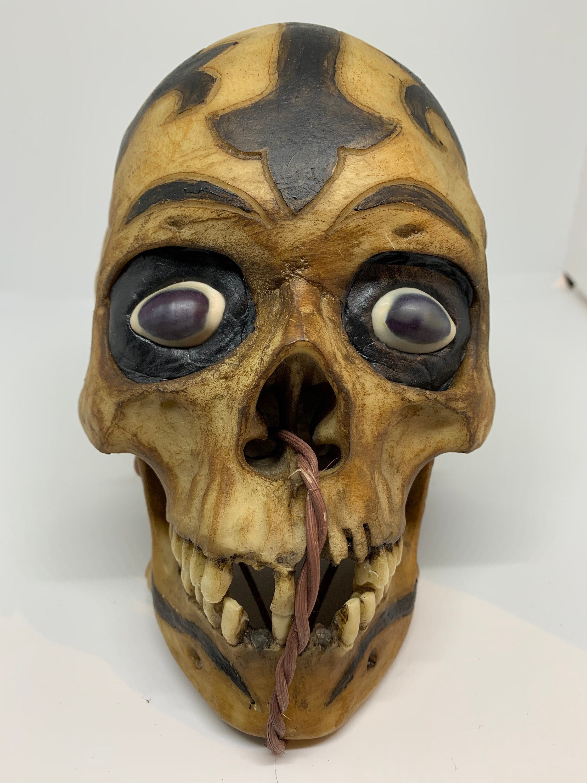 Borneo Headhunter Trophy Skull replica with cowrie shell eyes Borneo Headhunter Trophy Skull replica with cowrie shell eyes