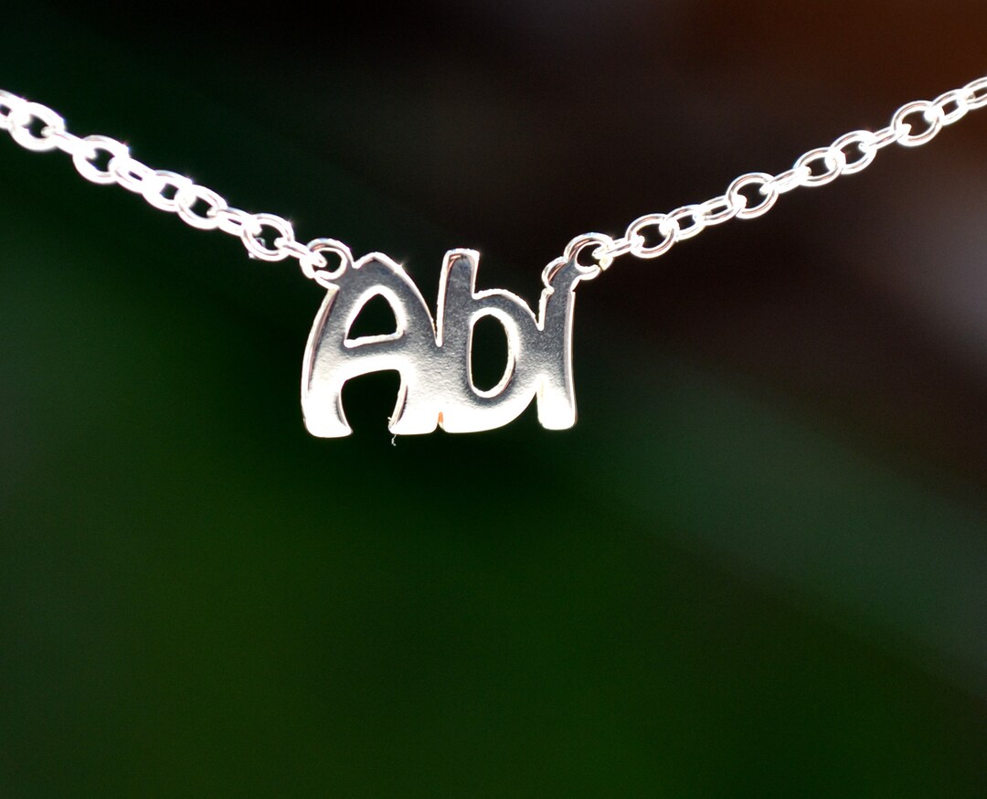 【HYERES LOR】Name rock silver pendant L Silver-tone Crystal Block Letter Initial Pendant Necklace