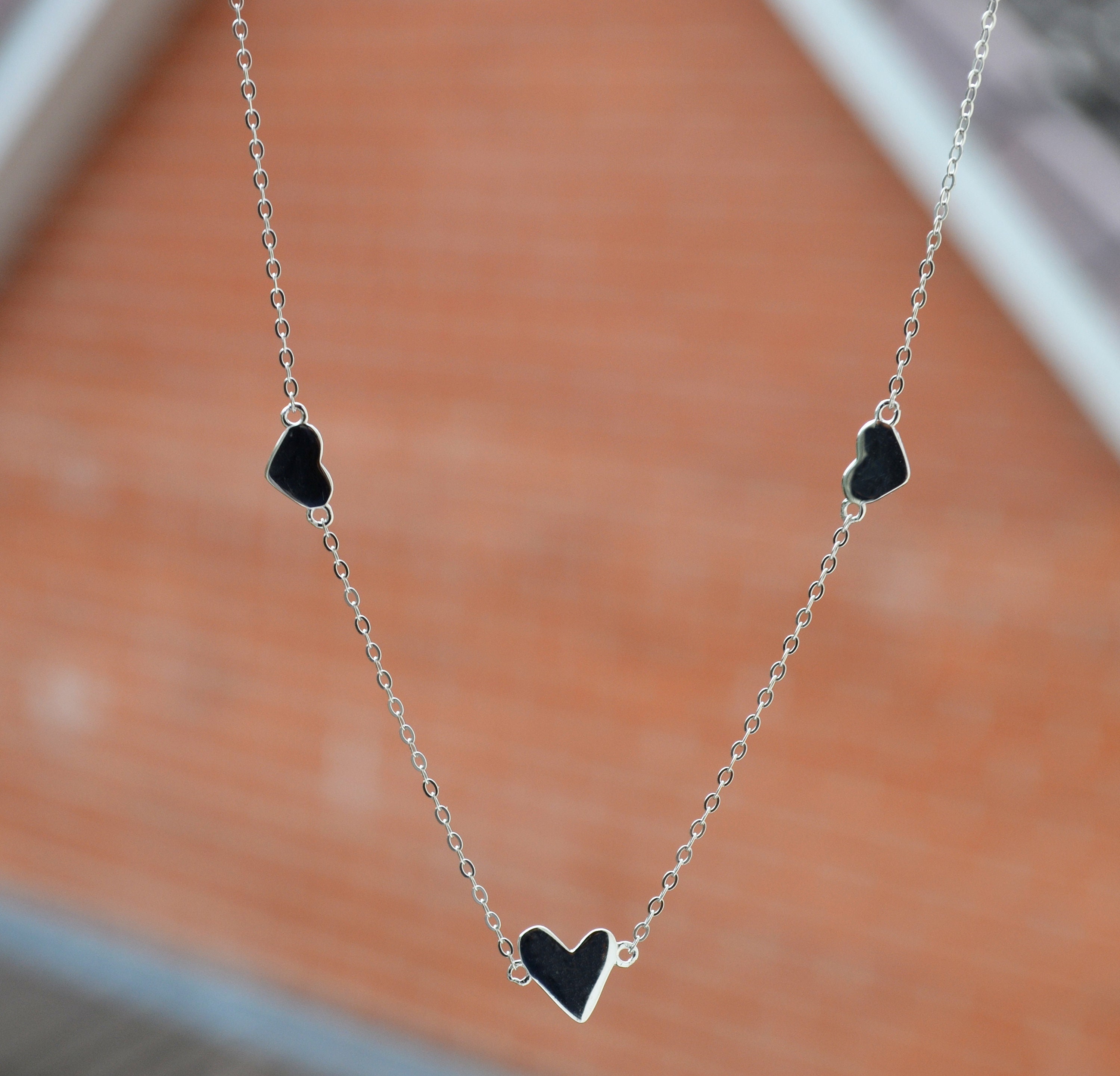 Sterling Silver 925 Rhodium Plated 3 Hearts Stationed 16-18 Sterling Silver 925 Rhodium Plated 3 Hearts Stationed 16-18