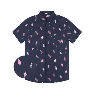 May include: A navy blue short-sleeved button-down shirt with a pattern of colorful popsicles and ice cream cones.