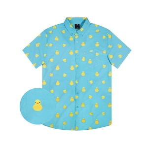 May include: A light blue short-sleeved button-down shirt with a yellow rubber ducky pattern.