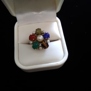 Multi colored stone gold filled ring by Burt Hassel.