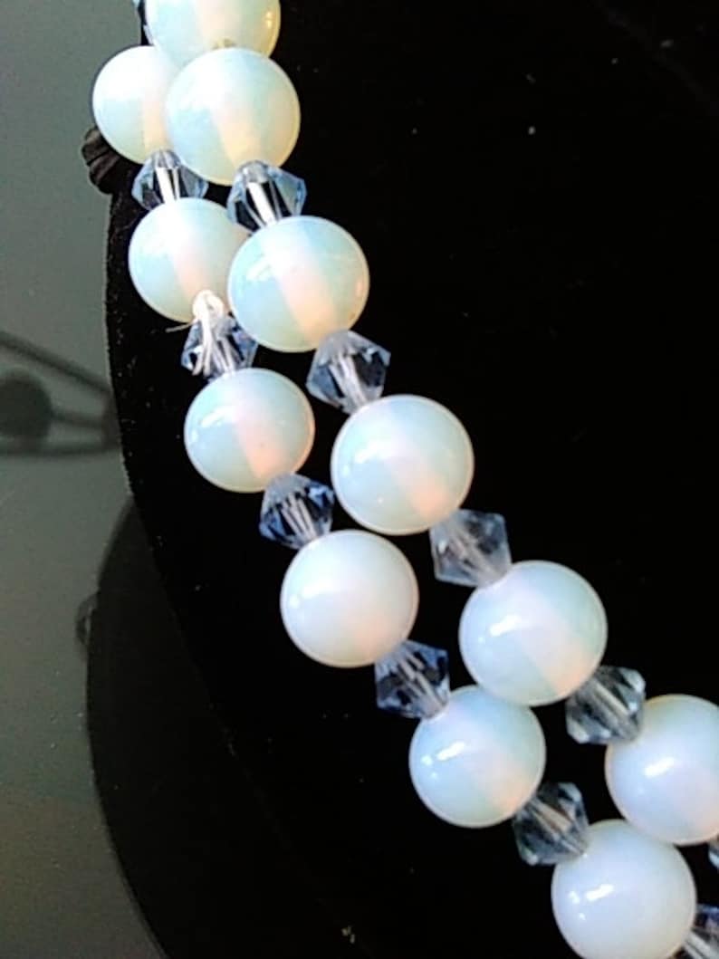 Antique opalescent milk glass beaded necklace with aquamarine faceted spacers