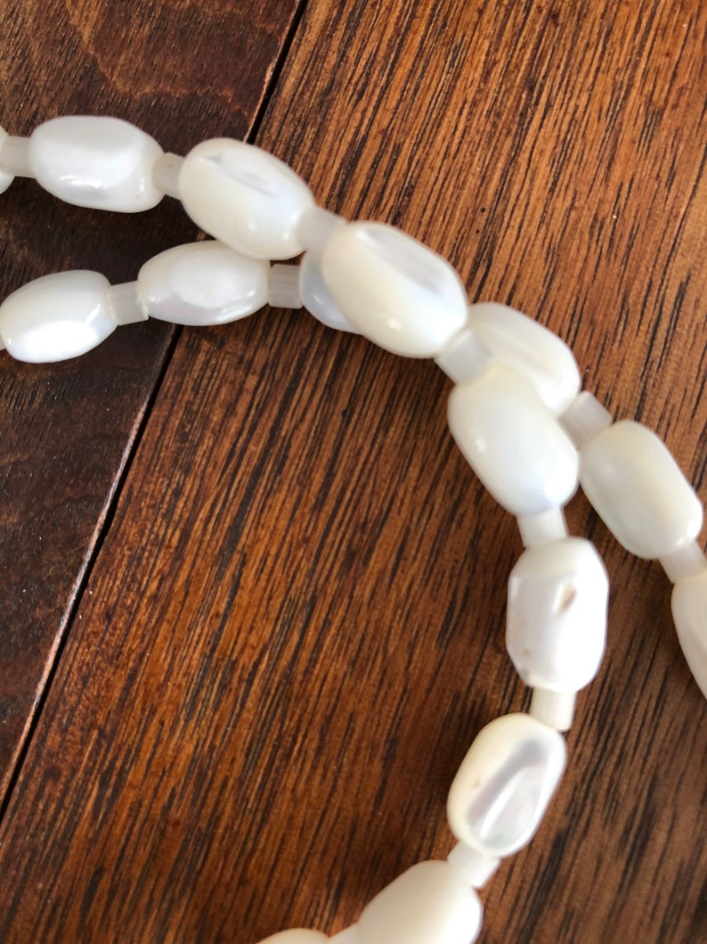 34 inches long Vintage mother of pearl and glass bead necklace