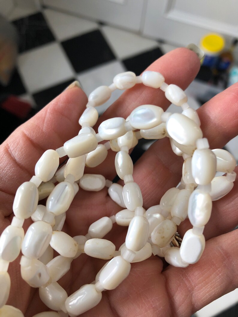 34 inches long Vintage mother of pearl and glass bead necklace
