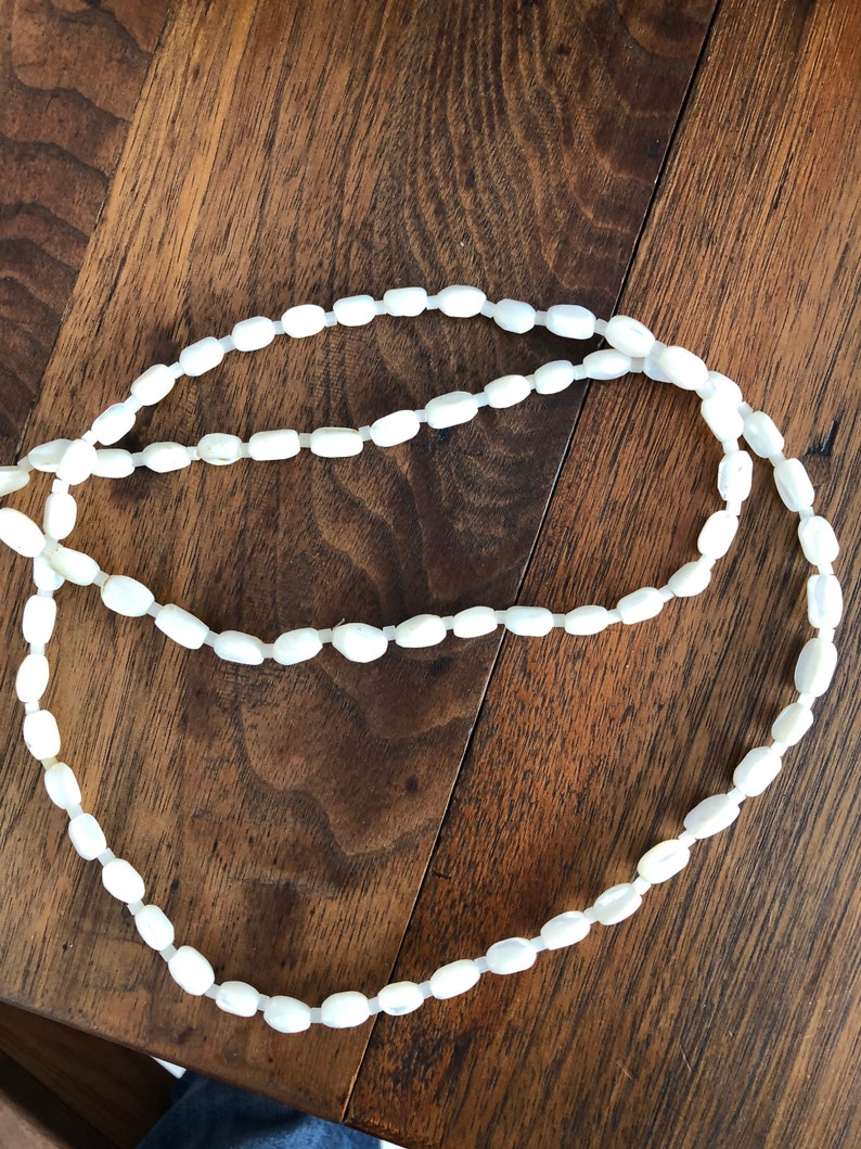 34 inches long Vintage mother of pearl and glass bead necklace