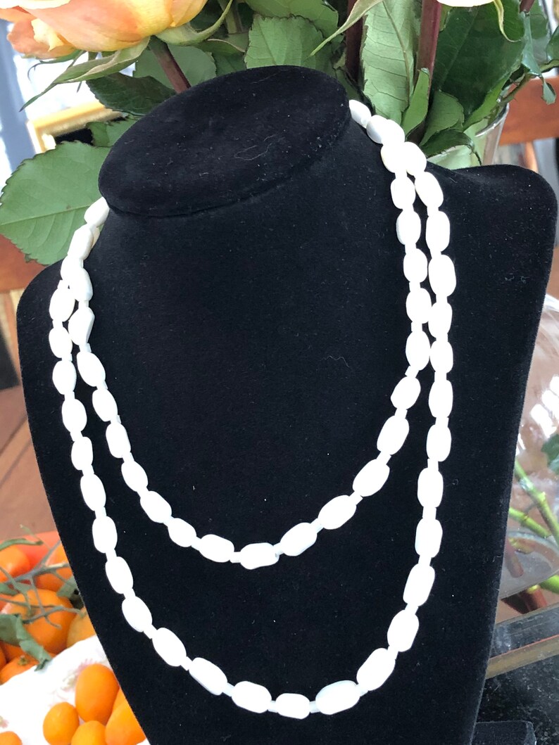 34 inches long Vintage mother of pearl and glass bead necklace