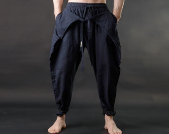 Pantalones de hombre negros de diseñador, modernos pantalones negros de algodón orgánico samurái para hombre.