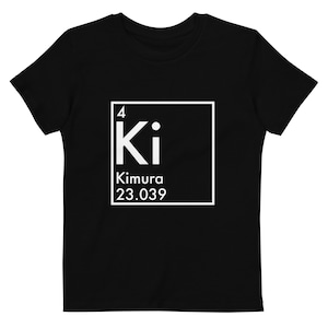 May include: Black t-shirt with a white graphic of a periodic table element. The element is labeled "Ki" with the number "4" above it and the text "Kimura 23.039" below it.