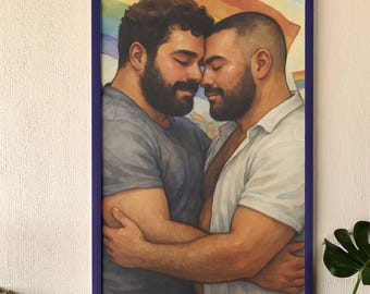 May include: A framed art print showing two men in an embrace, with a rainbow flag visible. The artwork portrays the men with closed eyes, in a tender moment. The frame is a dark blue, and the style is illustrative.