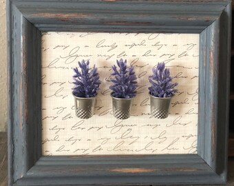 purple flowers in thimbles