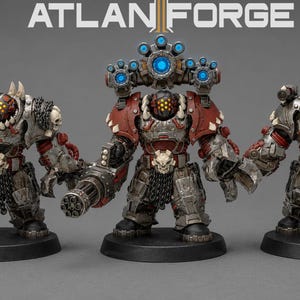 May include: Three miniature armored warrior figures with metallic silver and red plating, skull belt buckles, and spiked shoulder pads. The central figure features a large blue-lit weapon array. The text ATLAN FORGE is visible at the top.