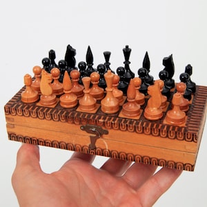 Vintage Handmade Touristic Chess Set 17x17 cm, 1970&#39;s Wooden Travel Chess Set from East Europe with Pyrography Decorated Folding Board