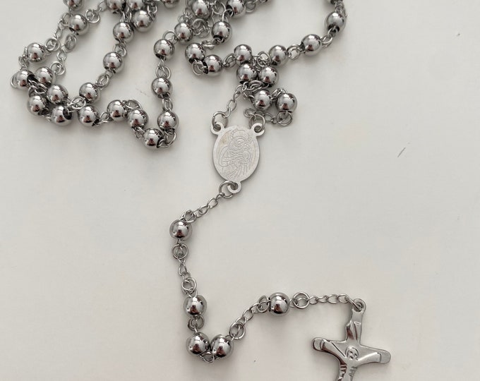 Religious Rosary from France in silver-colored steel, pendant of the Virgin Mary and Jesus on the Cross